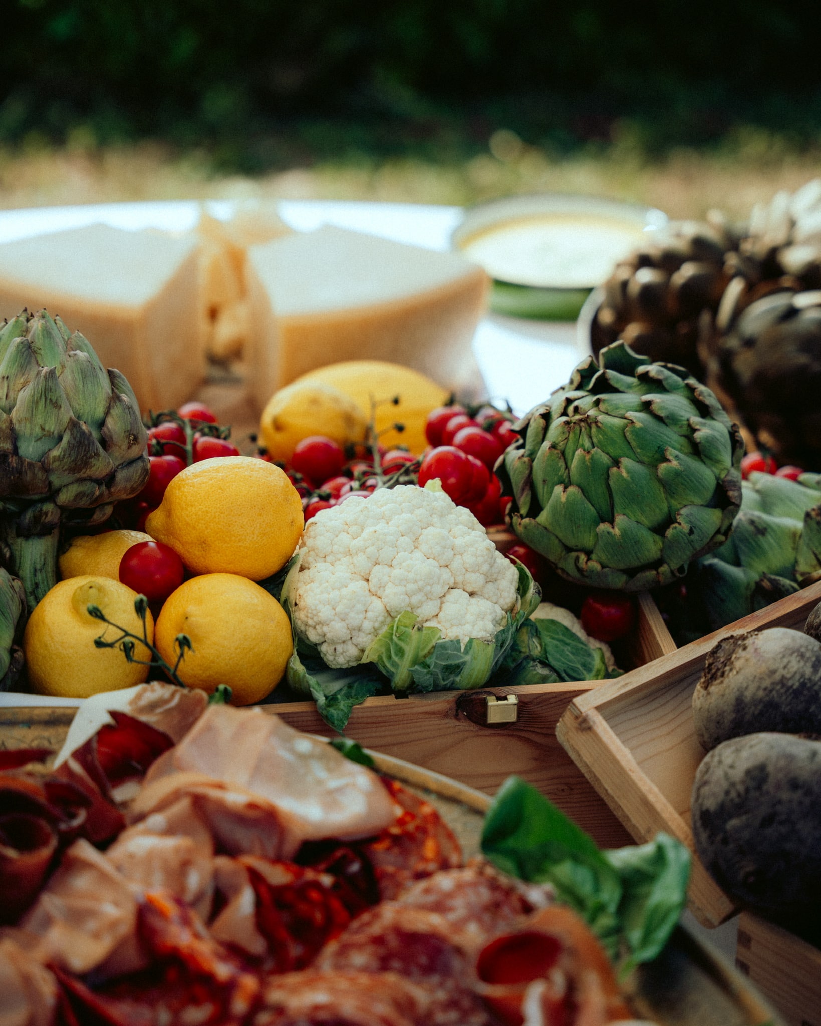 a group of people standing around a table